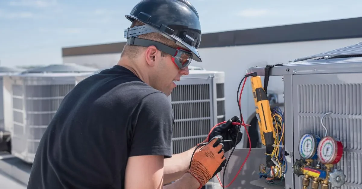 HVAC video marketing shoot of a technician servicing a rooftop unit